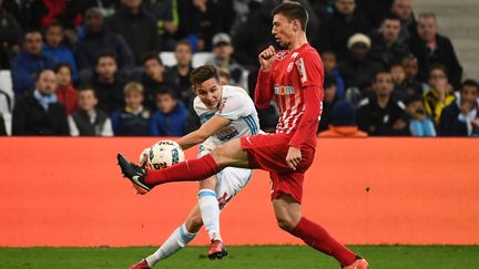 A l'aller, Florian Thauvin, buteur et passeur, avait grandement contribué au succès marseillais (3-0). (BORIS HORVAT / AFP)