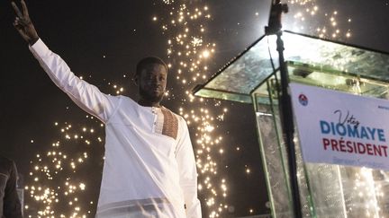 Opposition candidate Bassirou Diomaye Faye, who came first in the first round of the presidential election in Senegal, during a campaign meeting on March 22, 2024. (MARCO LONGARI / AFP)