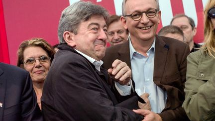 Le copr&eacute;sident du Parti de gauche, Jean-Luc M&eacute;lenchon et le secr&eacute;taire national du PCF, Pierre Laurent, &agrave; la F&ecirc;te de l'Humanit&eacute;, &agrave; La Courneuve (Seine-Saint-Denis), vendredi 13 septembre 2013.&nbsp; (FRED DUFOUR / AFP)