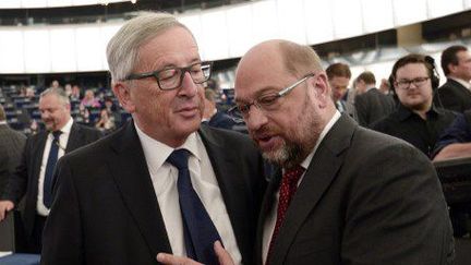 Les deux grandes figures politiques de la «grande coalition»: Jean-Claude Juncker (PPE,Commission) et Martin Schulz (S&amp;D, Parlement). D'accord sur tout ? (AFP PHOTO / FREDERICK FLORIN)