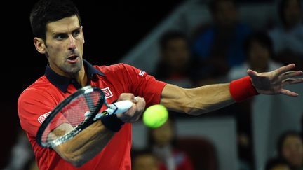 Novak Djokovic, lors de la finale à Pékin, face à Rafael Nadal. (WANG ZHAO / AFP)