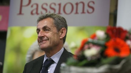 Nicolas Sarkozy dédicace son livre "Passions", à Montpellier (Hérault), le 18 décembre 2019. (NICOLAS GUYONNET / HANS LUCAS / AFP)