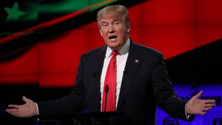 Donald Trump lors d'un débat entre les candidats à la primaire républicaine, le 10 mars 2016 à Miami (Floride, Etats-Unis). (CARLO ALLEGRI / REUTERS)