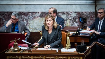 Yaël Braun-Pivet prend la parole lors d'une séance de questions au gouvernement, à l'Assemblée nationale, le 13 mars 2024. (XOSE BOUZAS / HANS LUCAS / AFP)