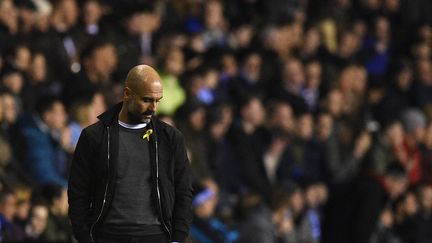 Pep Guardiola  (OLI SCARFF / AFP)