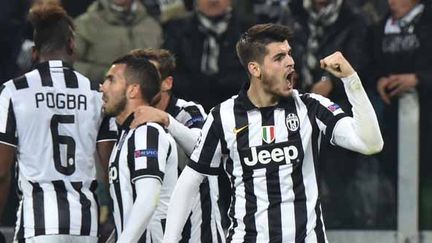 La joie de Pogba, Tevez et Morata.  (GIUSEPPE CACACE / AFP)