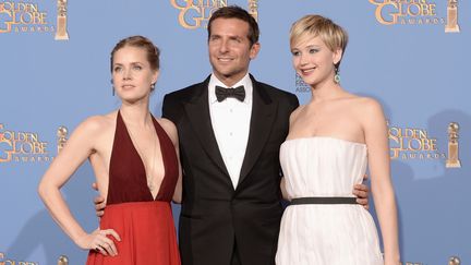 Amy Adams, Bradley Cooper et Jennifer Lawrence, le 12 janvier 2014 &agrave; Beverly Hills (Californie), sont &agrave; l'affiche d'"American Bluff". (GETTY IMAGES NORTH AMERICA / AFP)