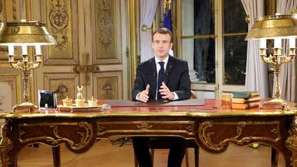 Emmanuel Macron s'adresse aux Français, le 10 décembre 2018, et annonce la création de cette prime exceptionnelle versée par les entreprises.&nbsp; (LUDOVIC MARIN / AFP)