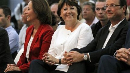 Ségolène Royal (G), Martine Aubry (C) et François Hollande à La Rochelle le le 28 août 2011 (AFP PHOTO / PATRICK KOVARIK)