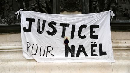 A banner "Justice for Nael" deployed on the Place de la République, on June 28, 2023, in Paris.  (MAURIZIO ORLANDO / HANS LUCAS / AFP)