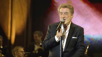 Eddy Mitchell était déjà remonté sur scène en 2014 au Palais Omnisports de Paris-Bercy pour le concert "Les Vieilles Canailles", avec Johnny Hallyday et Jacques Dutronc
 (SIPA)