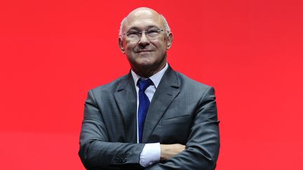 Le ministre du Travail, Michel Sapin, le 24 septembre 2013 &agrave; Bordeaux (Gironde), lors des journ&eacute;es parlementaires du PS. (NICOLAS TUCAT / AFP)