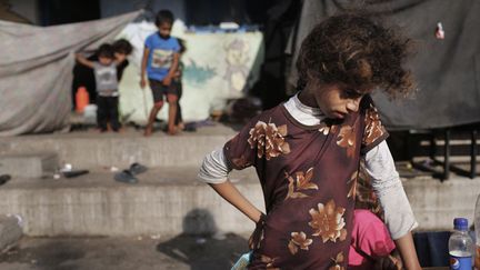 &nbsp; (Des enfants palestiniens réfugiés dans une école de l'ONU à Jabaliya, dans le nord de la bande de Gaza © REUTERS/Finbarr O'Reilly)