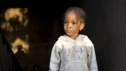 Cette petite fille de deux ans a fui vers Bamako avec sa famille élargie en avril 2012 pour échapper aux combats à Gao, où son père avait été tué par les rebelles. (HCR/H. Caux)