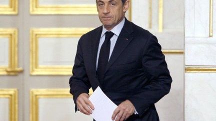 Nicolas Sarkozy s'apprêt à donner une conférence de presse, à l'issue du sommet de crise, à l'Elysée, le 18 janvier 2012. (AFP - Remy de la Mauvinière)