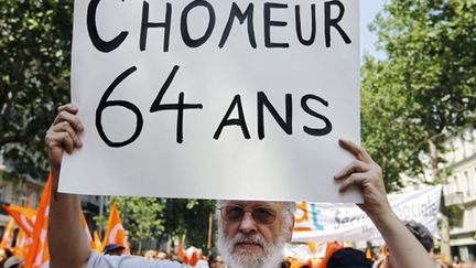 A la manifestation parisienne contre la réforme des retraites, cette pancarte: "chômeur à 64 ans" (AFP/JOEL SAGET)