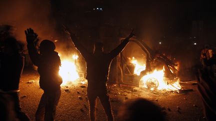 Un manifestant sur la place Tahrir, au Caire, lundi 28 janvier 2013. (MOHAMMED ABED / AFP)