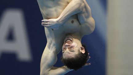 L'Ukrainien Illya Kvasha lors de l'&eacute;preuve du plongeon de 3 m&egrave;tres en Coupe du monde de la discipline &agrave; Londres (Royaume-Uni), le 22 f&eacute;vrier 2012. (ANDREW WINNING / REUTERS)