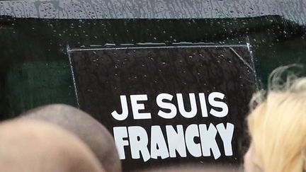 &nbsp; (Marque de soutien au policier Franck Brinsolaro lors de ses obsèques le 15 janvier 2015 © AP/SIP/Remy de la Mauviniere)