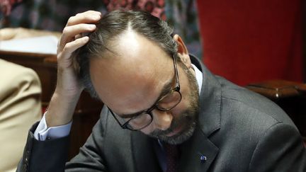 Le Premier ministre, Edouard Philippe, lors de la séance des questions au gouvernement, le 19 décembre 2017, à l'Assemblée nationale, à Paris. (PATRICK KOVARIK / AFP)