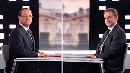 Fran&ccedil;ois Hollande et Nicolas Sarkozy s'opposent lors du d&eacute;bat d'entre-deux-tours, le 2 mai 2012. (PATRICK KOVARIK / AFP)