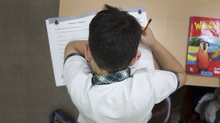 Un écolier sud-coréen au travail en aout 2016&nbsp;&nbsp; (YELIM LEE / AFP)