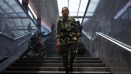 Des combattants pro-russes dans une station de métro du centre ville.
 
 
 (Maria Turchenkova)