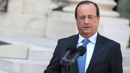 Fran&ccedil;ois Hollande, pendant une conf&eacute;rence de presse commune avec le chef de la Coalition nationale des forces de l'opposition et de la r&eacute;volution syrienne, &agrave; l'Elys&eacute;e (Paris), le 29 ao&ucirc;t 2013. (KENZO TRIBOUILLARD / AFP)