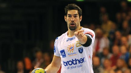 Nikola Karabatic, le 27 septembre 2012, durant un match de Ligue des champions contre Flensburg, en Allemagne. (BENJAMIN NOLTE / AFP)