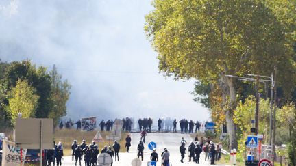 Police on the sidelines of the demonstration against the motorway project between Castres and Toulouse, in Saïx (Tarn), October 21, 2023. (CHARLY TRIBALLEAU / AFP)