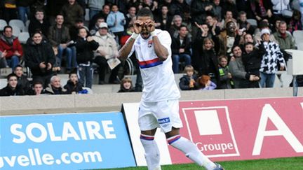 Michel Bastos fait les gros yeux (PHILIPPE MERLE / AFP)