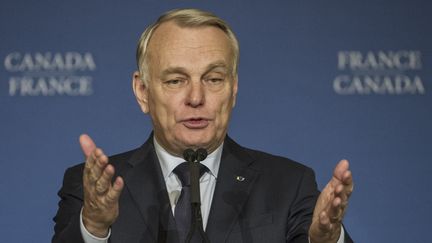 Le Premier ministre, Jean-Marc Ayrault, en conf&eacute;rence de presse le 13 mars 2013 &agrave; Ottawa (Canada). (ROGERIO BARBOSA / AFP)