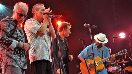 Jean-Jacques Milteau, Youssef Remadna, Greg Zlap et Eric Bibb sur la scène de Jazz à Vienne
 (Olivier Flandin)