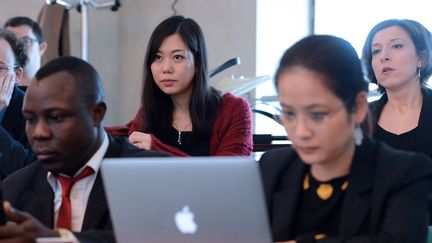 Etudiants japonais, polonais et congolais lors d'un séminaire de l'Ecole Nationale d'Administration. (PATRICK HERTZOG / AFP)