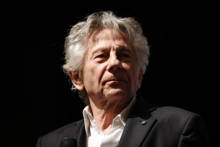 Le réalisateur Roman Polanski sur scène après la première de son film "J'accuse", à Paris, le 4 novembre 208. (THOMAS SAMSON / AFP)