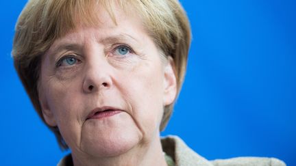 La chanceli&egrave;re allemande, Angela Merkel, lors d'une conf&eacute;rence de presse &agrave; Berlin, le 10 juillet 2014. (MAURIZIO GAMBARINI / DPA / AFP)