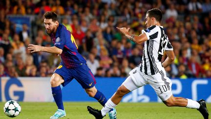 Lionel Messi (Barcelone) et Paulo Dybala (Juventus)