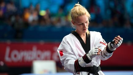 La m&eacute;daill&eacute;e olympique fran&ccedil;aise de taekwondo, Marl&egrave;ne Harnois, lors de sa demi-finale aux JO de Londres, le 9 ao&ucirc;t 2012. (CHAMUSSY / NIVIERE / SIPA)