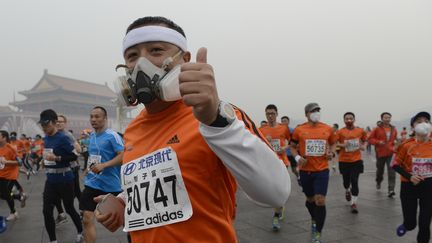 Un participant au marathon de P&eacute;kin, le 19 octobre 2014. (REUTERS)