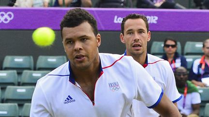 Les Français Jo-Wilfried Tsonga (à gauche) et Michael Llodra (à droite)