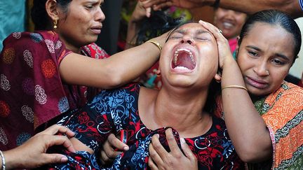 En novembre, il remporte le 2e prix dans la catégorie «Spot News» à l’Atlanta Photojournalism Award pour une photo illustrant les catastrophes dans les usines textiles du Bangladesh. (Munir uz Zaman)