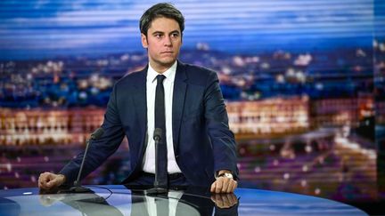 Prime Minister Gabriel Attal, on TF1, January 11, 2024. (JULIEN DE ROSA / AFP)