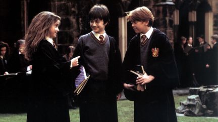 Emma Watson, Daniel Radcliffe et Ruper Grint dans "Harry Potter à l'école des sorciers", le premier film de la saga. (RONALDGRANT/MARY EVANS/SIPA)