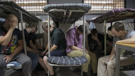 Russian prisoners of war, captured by the Ukrainian military on the Ukrainian-Russian border in the Kursk region, at a temporary detention center in the Sumy region, Ukraine, August 16, 2024. (STR/MAXPPP)