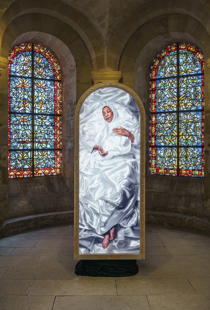 L'un des 6 gigantesques portraits exposés dans la crypte de la Basilique 
 (Aiman Saad Ellaoui)