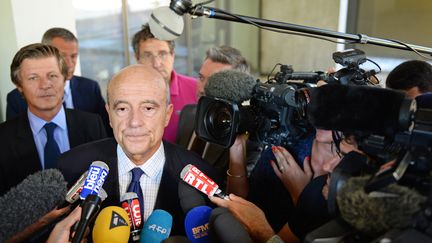 Alain Jupp&eacute; parle &agrave; des journalistes, &agrave; Bordeaux (Gironde), le 18 septembre 2014. (MEHDI FEDOUACH / AFP)