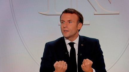 Emmanuel Macron, à l'Elysée, le 14 octobre 2020. (LUDOVIC MARIN / AFP)