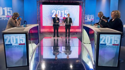 Marie-Guite Dufay, François Sauvadet et Sophie Montel, candidats aux régionales en Bourgogne-Franche-Comté, lors d'un débat à Dijon (Côte-d'Or), le 9 décembre 2015. (ROMAIN LAFABREGUE / AFP)