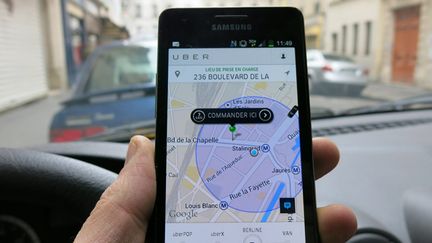 &nbsp; (Le service met en relation des passagers et des automobilistes qui ne sont pas des chauffeurs professionnels via une application smartphone © Maxppp)