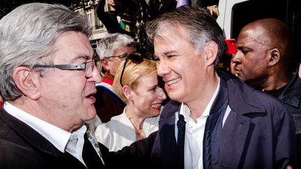 Jean-Luc Mélenchon, chef de file de La France insoumise, et Olivier Faure, premier secrétaire du Parti socialiste, à Paris, le 1er mai 2022. (ALEXANDRE BRE / HANS LUCAS / AFP)